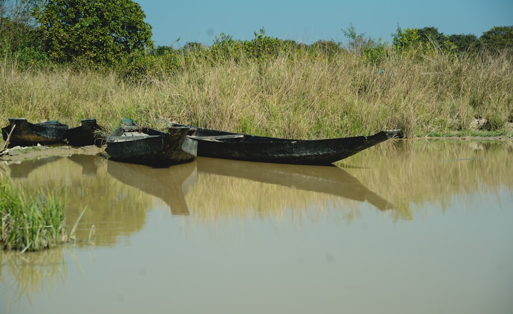 a couple of boats that are sitting in the water