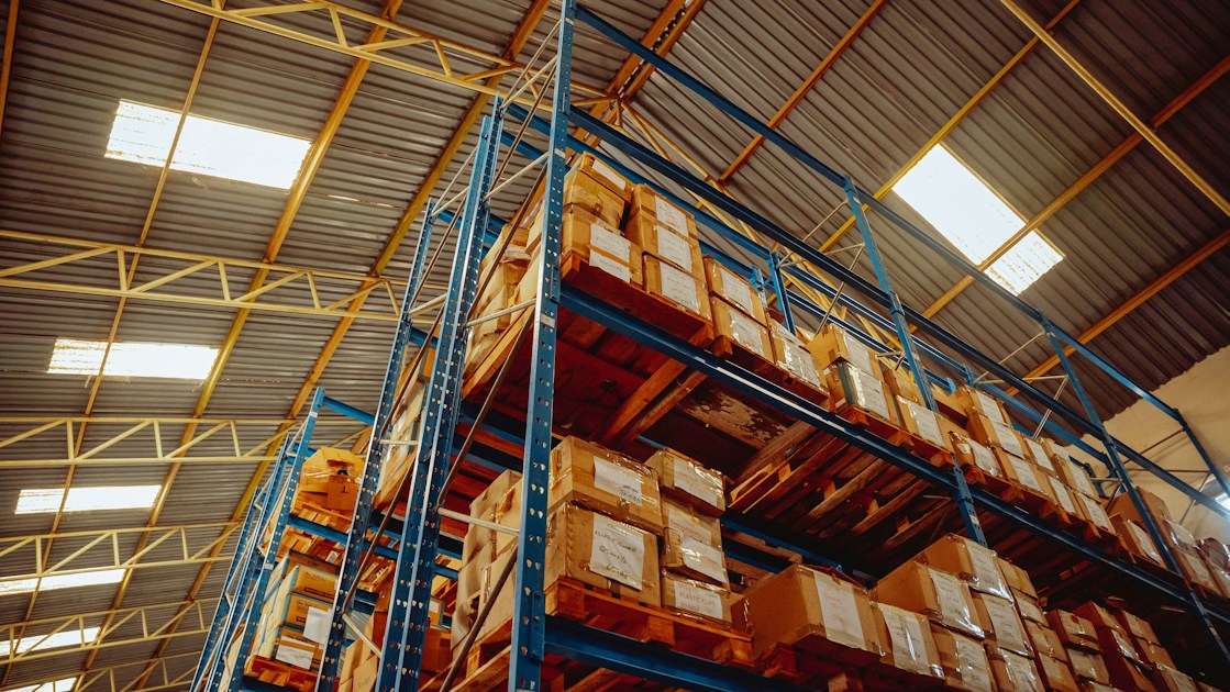 A large stack of boxes in a warehouse