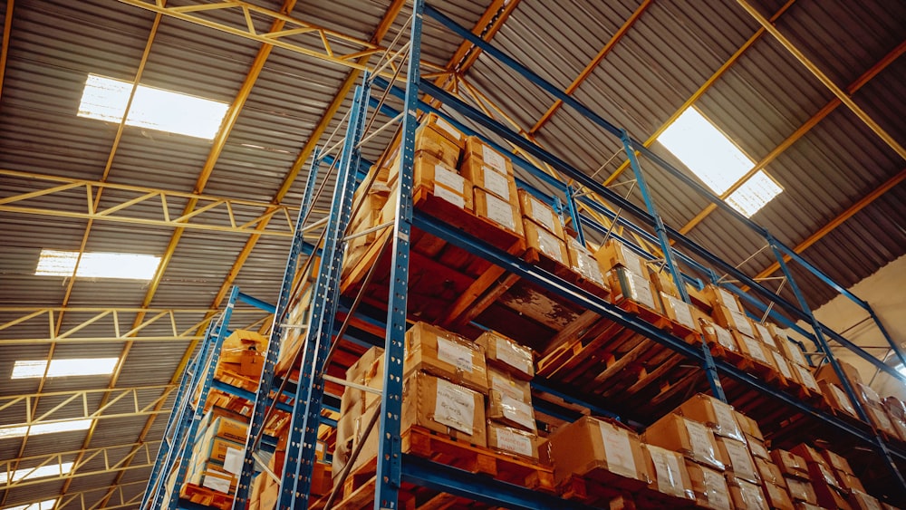 a large stack of boxes in a warehouse