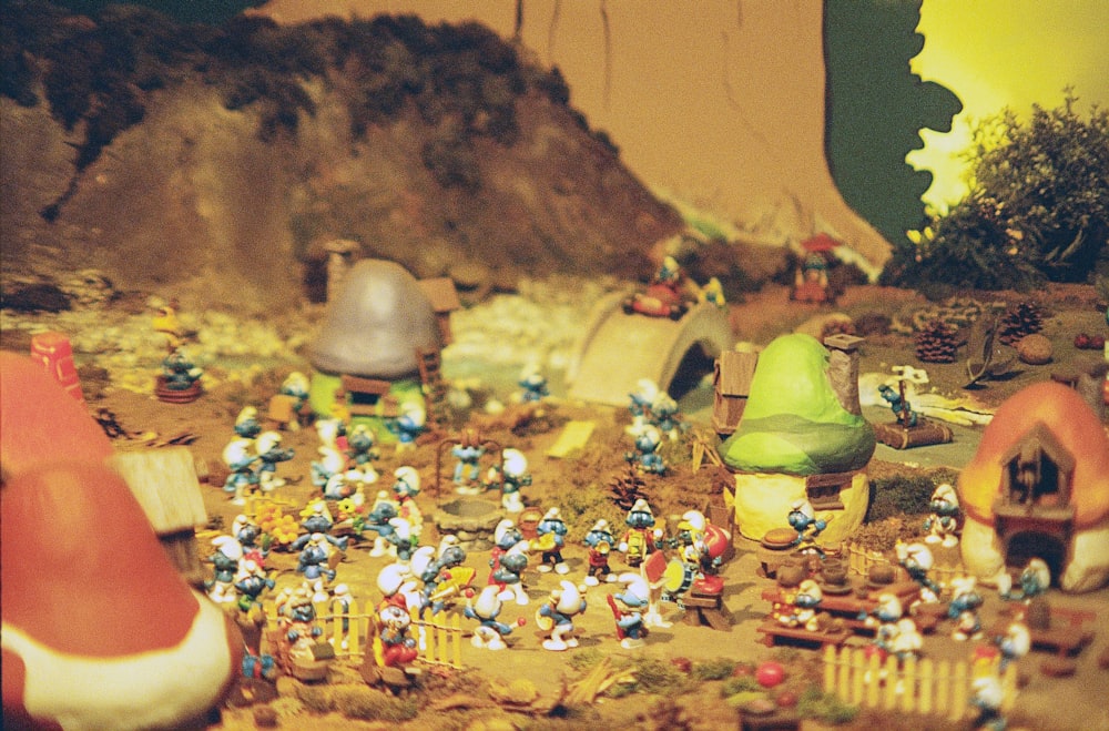a bunch of toy figurines that are on a table