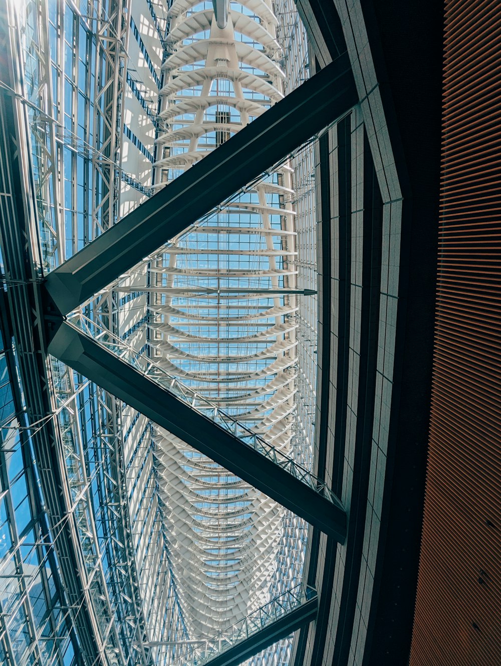 the inside of a building looking up at the sky