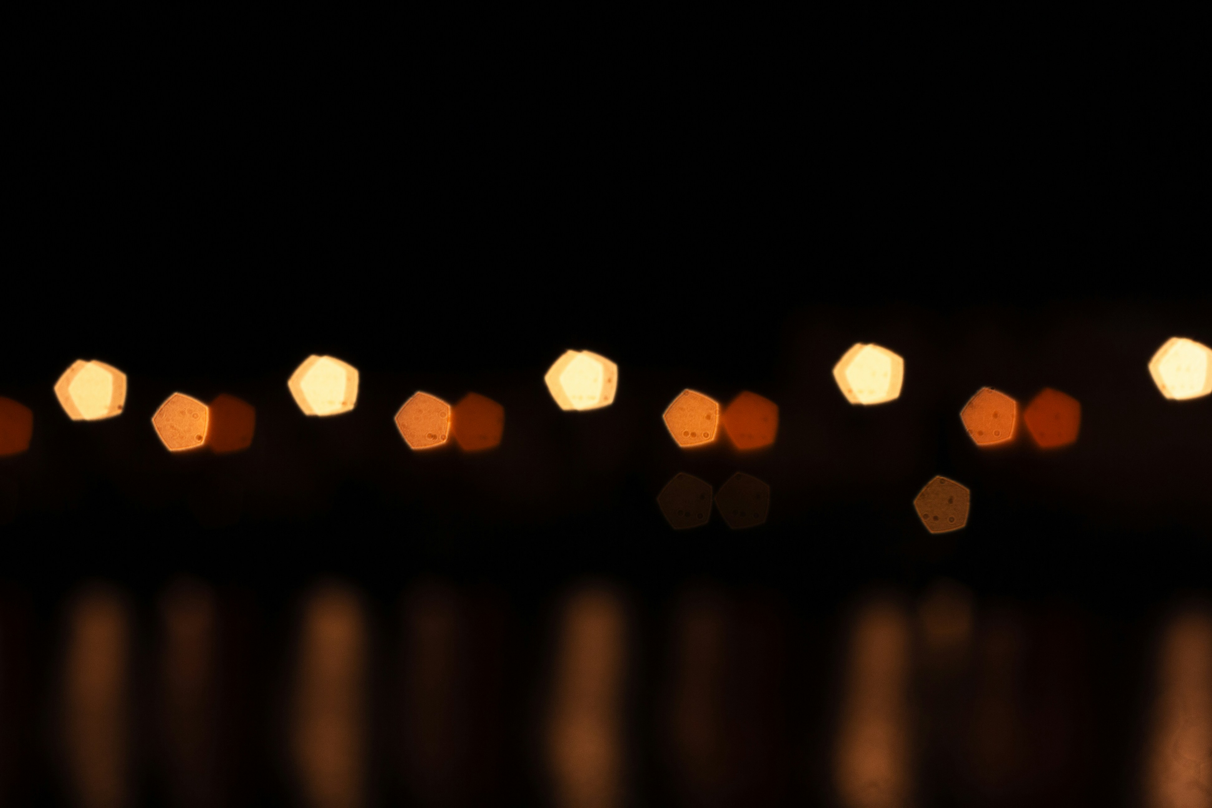 a blurry photo of some lights in the dark