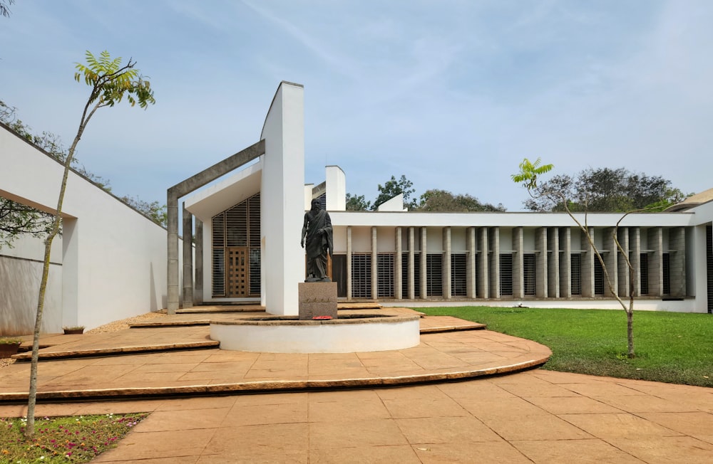 a courtyard with steps leading to a building