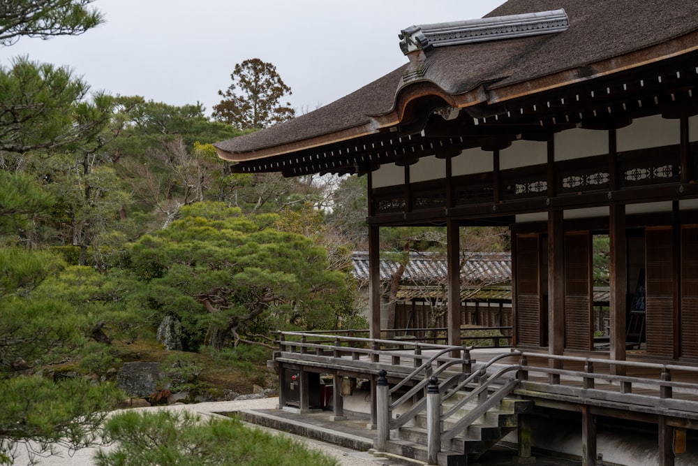 a building with a wooden walkway leading to it