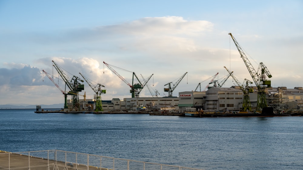 a harbor filled with lots of large cranes