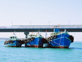 a couple of boats that are in the water