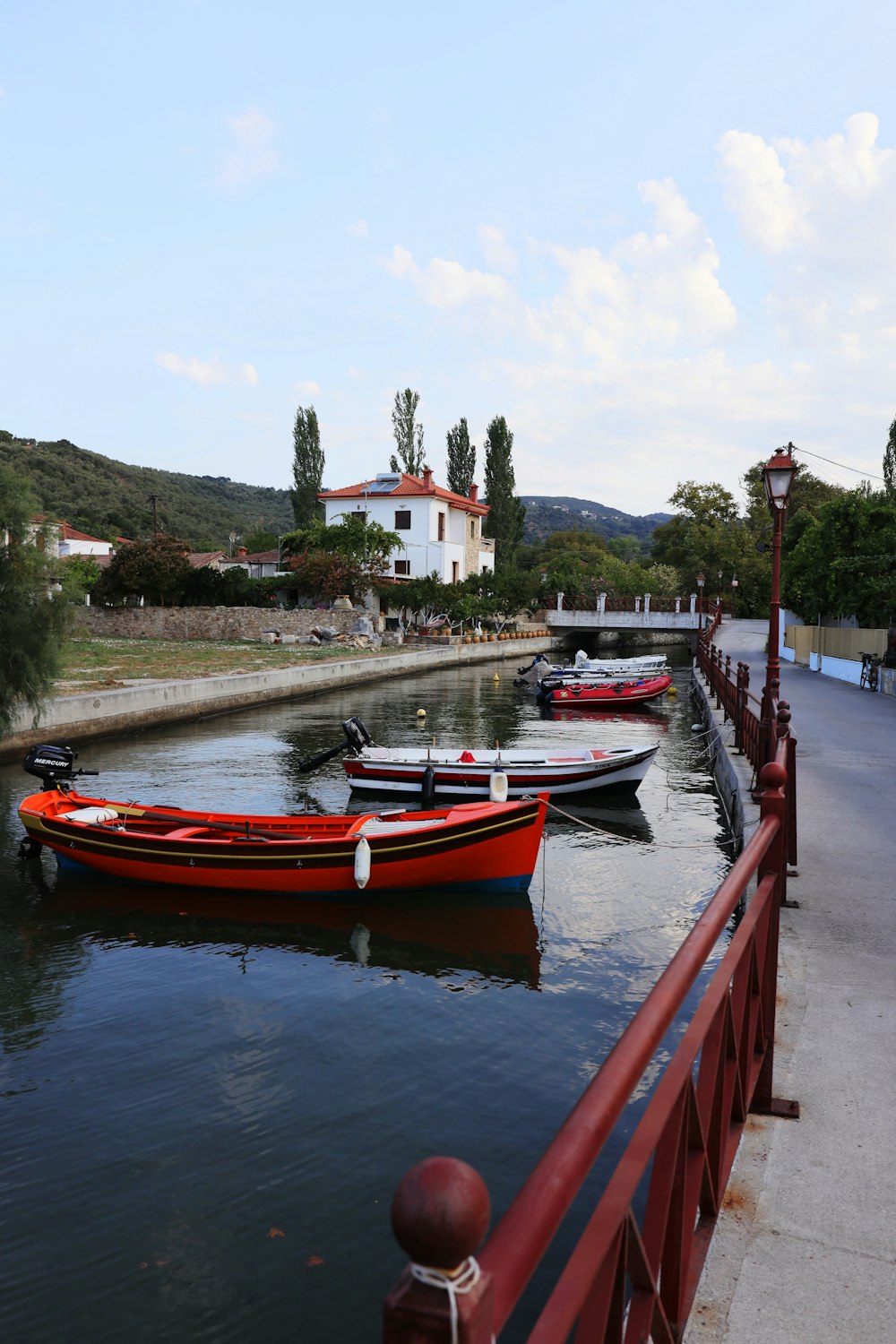 a couple of boats that are sitting in the water