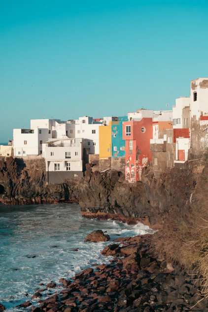 a view of a beach with a bunch of houses on it
