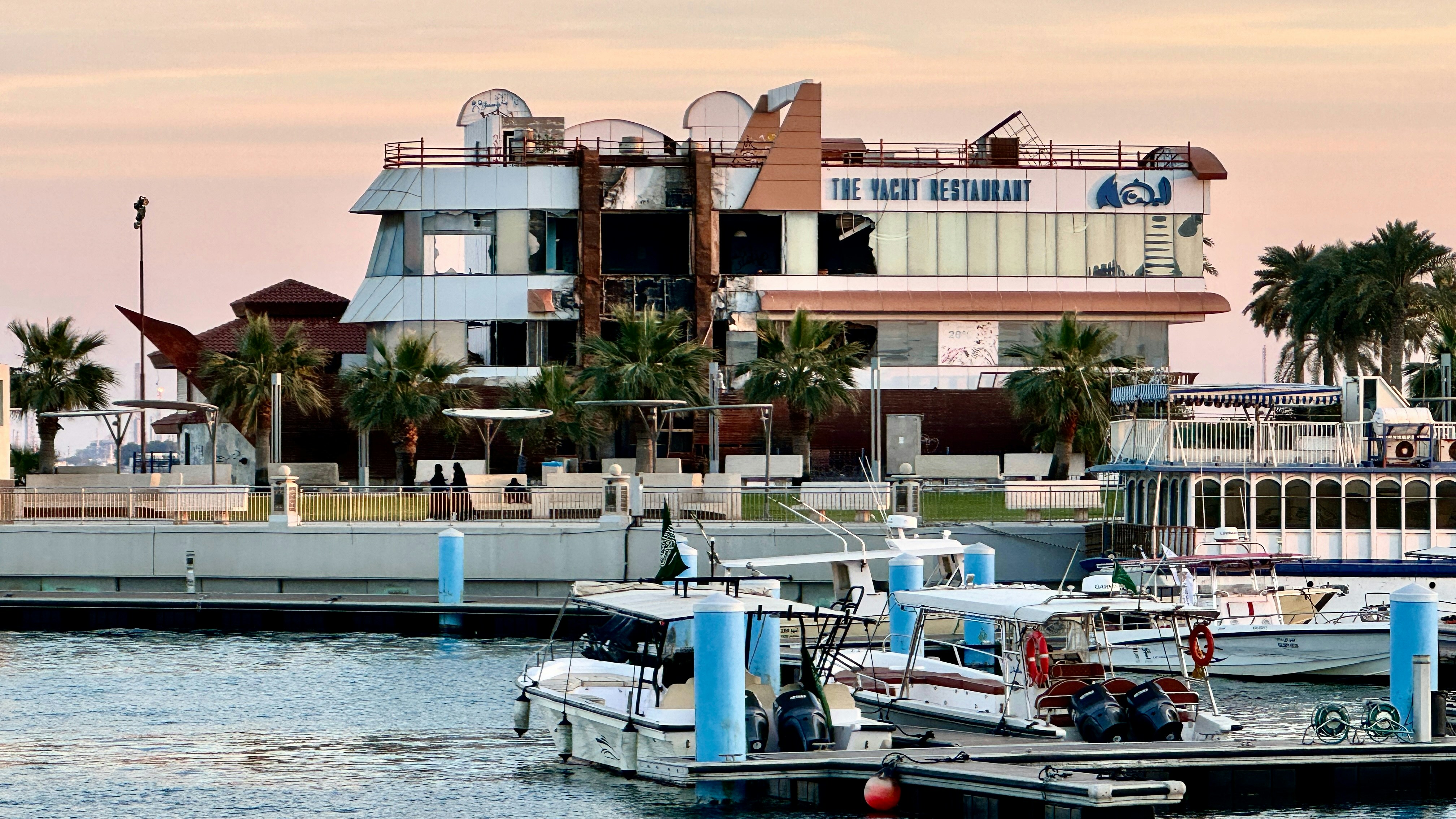 a couple of boats that are sitting in the water