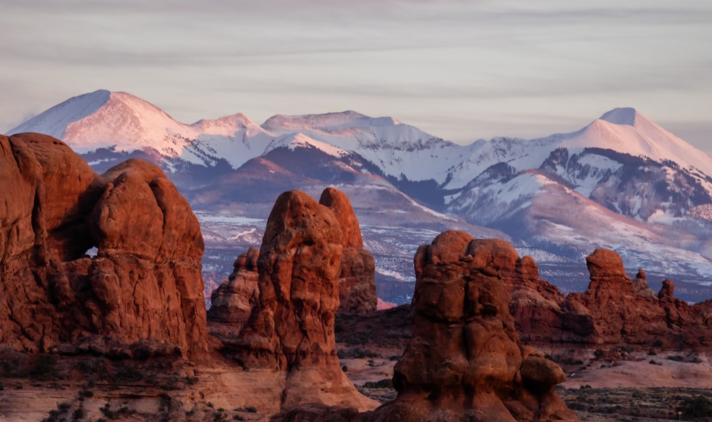 the mountains are covered in snow in the desert