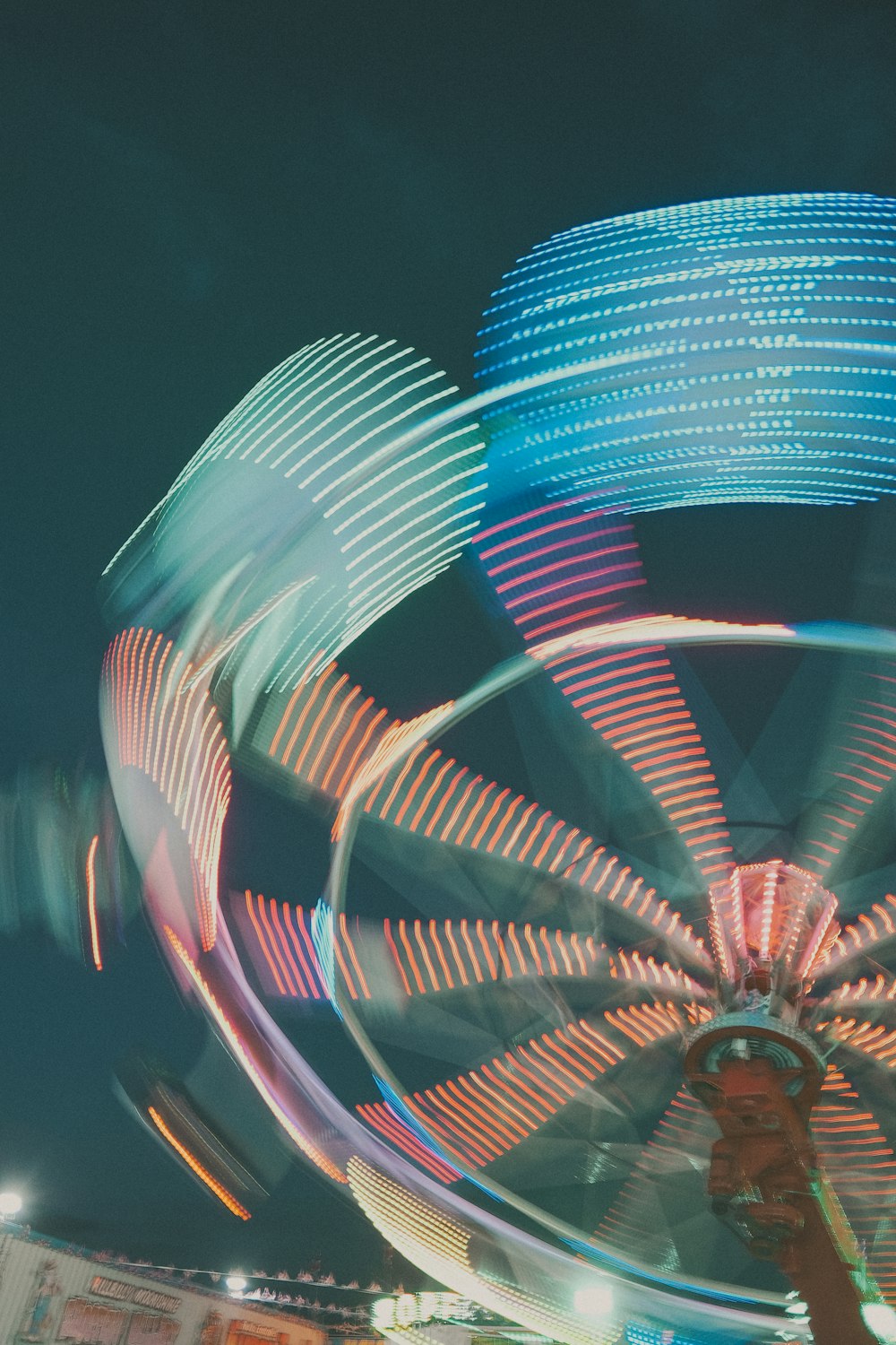 a ferris wheel at a carnival at night