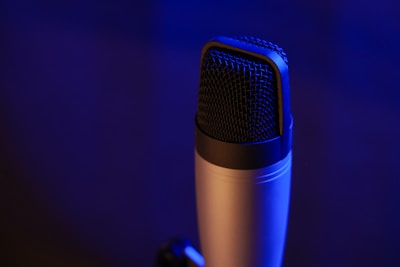 a close up of a microphone in a dark room