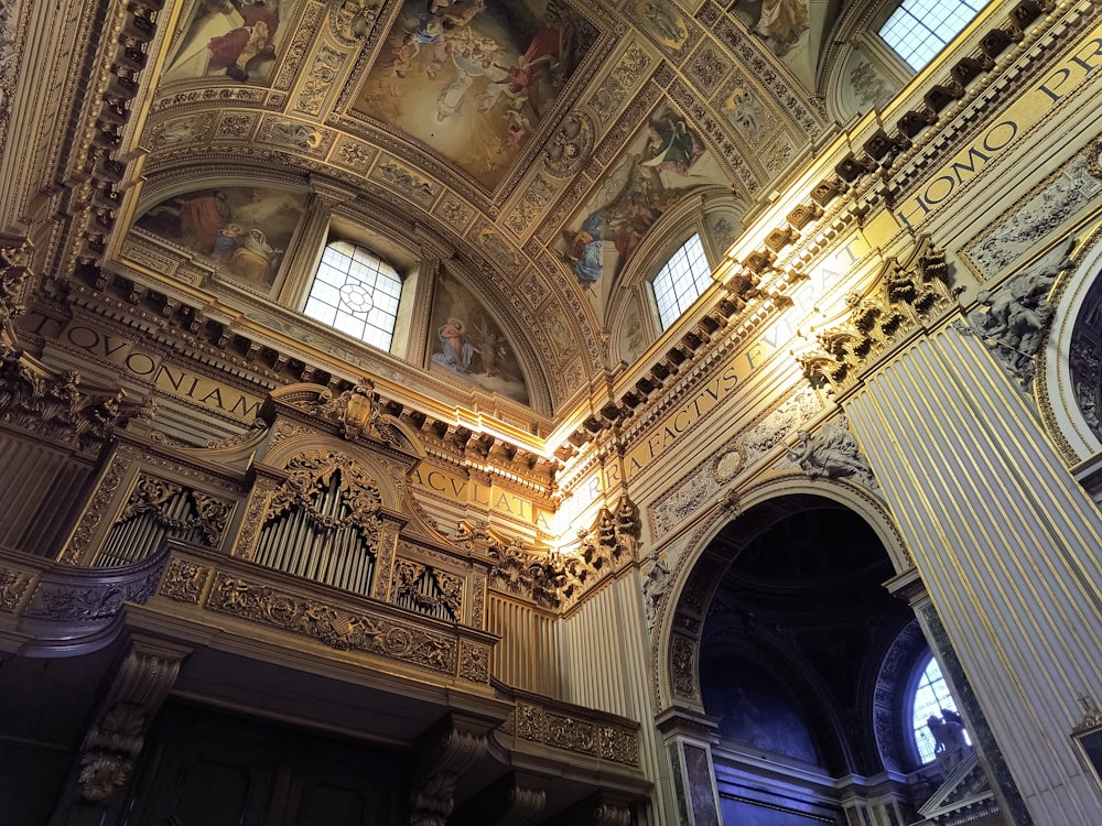 the ceiling of a church with a painting on it