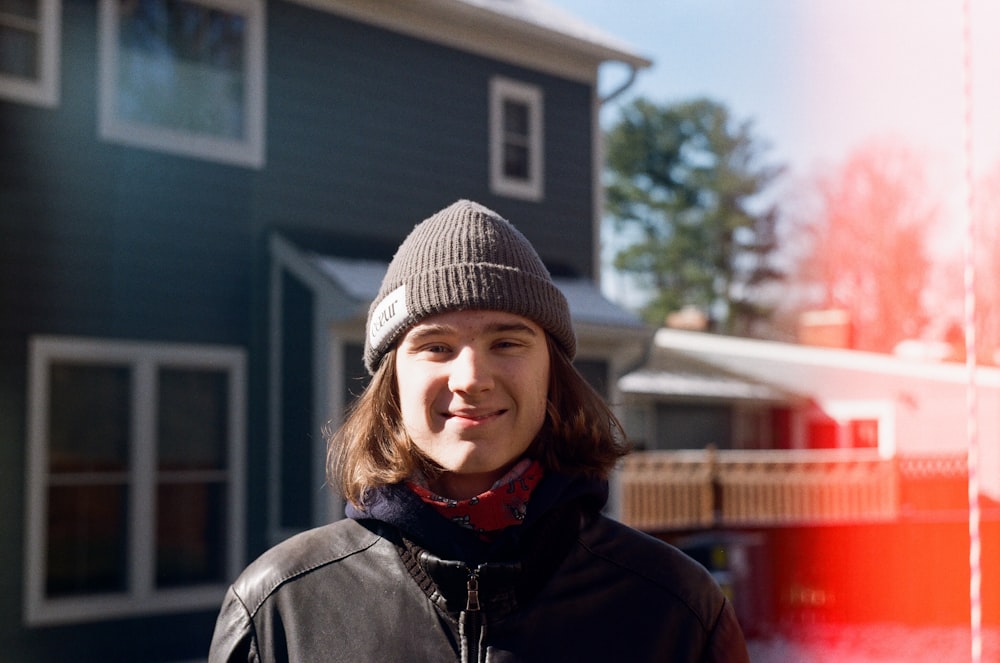 a person standing in front of a house