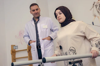 a man and a woman standing next to each other