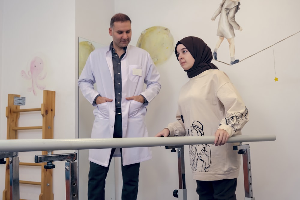 a man and a woman standing next to each other