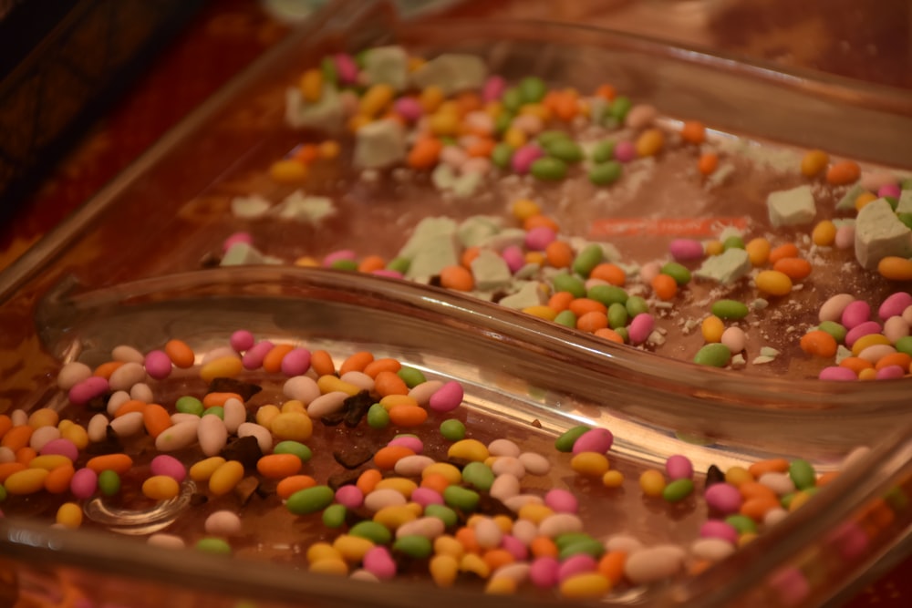 a couple of trays filled with lots of candy