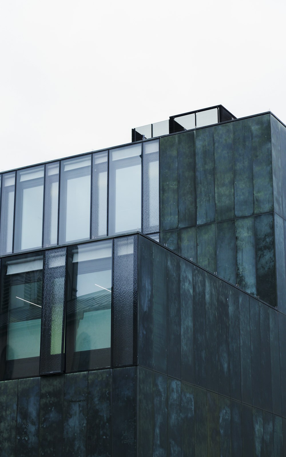 a tall building with lots of windows on top of it