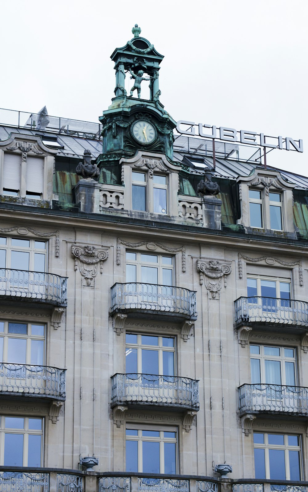 a large building with a clock on the top of it