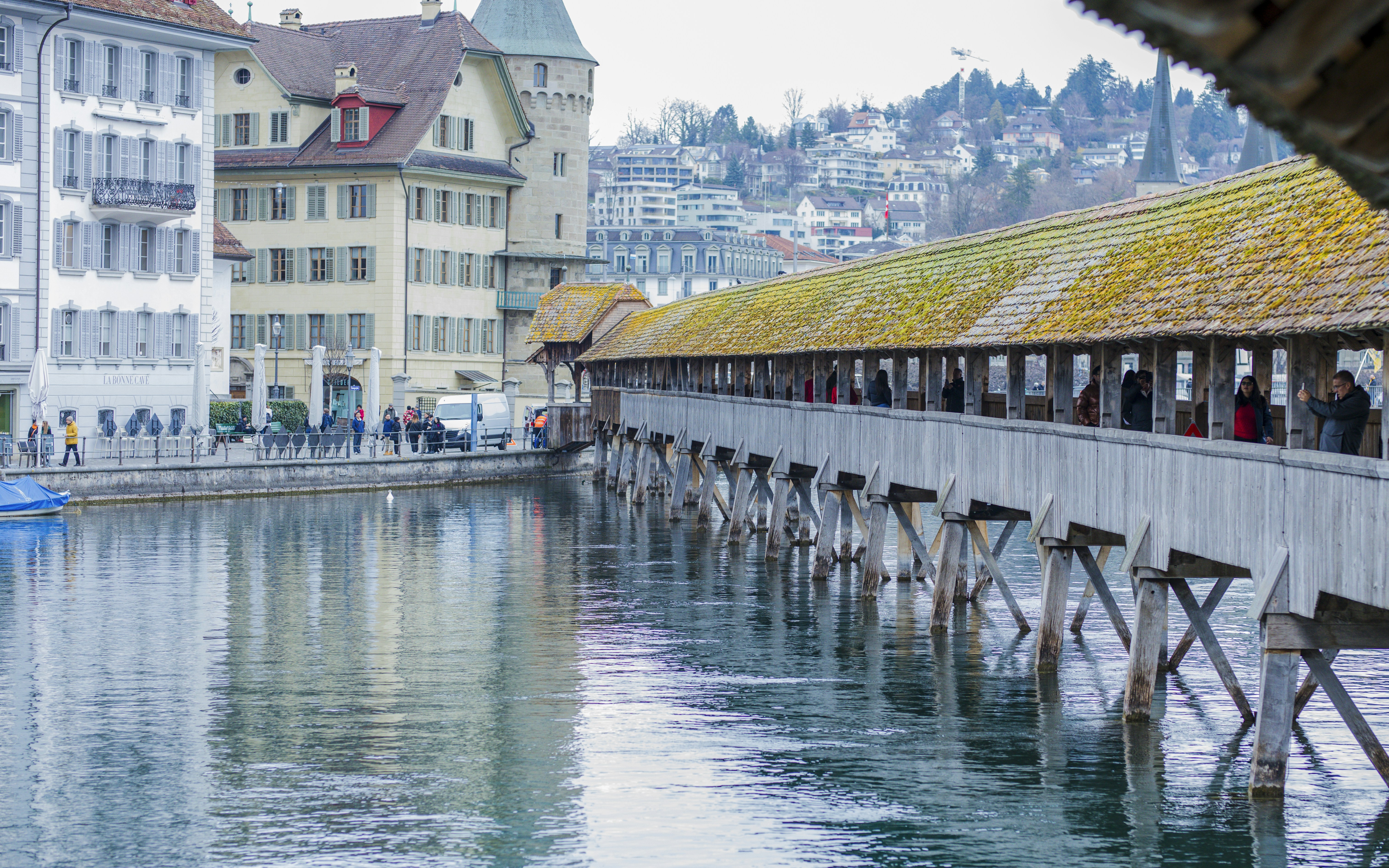 a long wooden bridge over a body of water