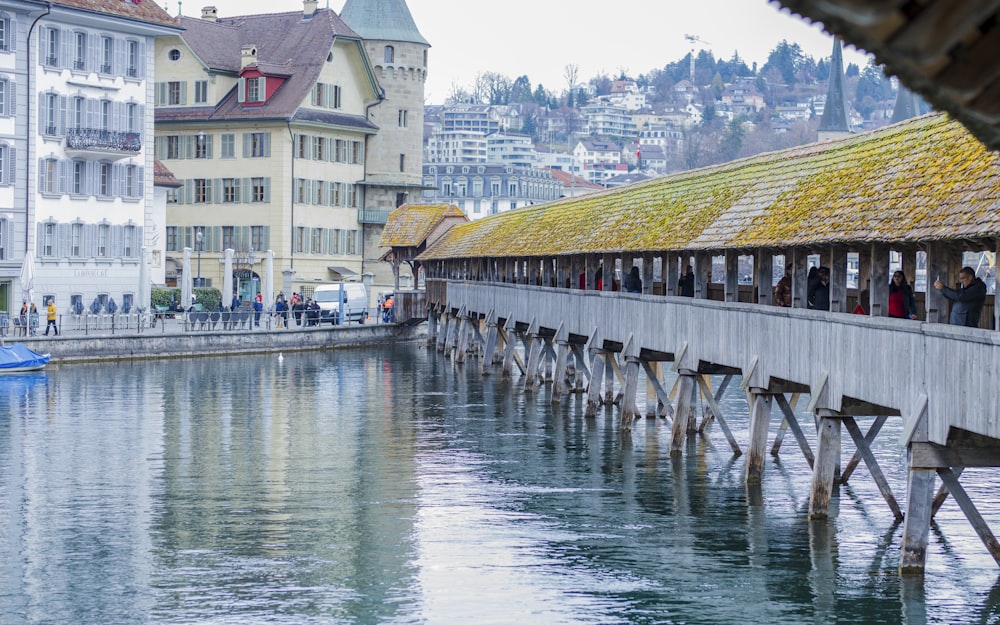 a long wooden bridge over a body of water