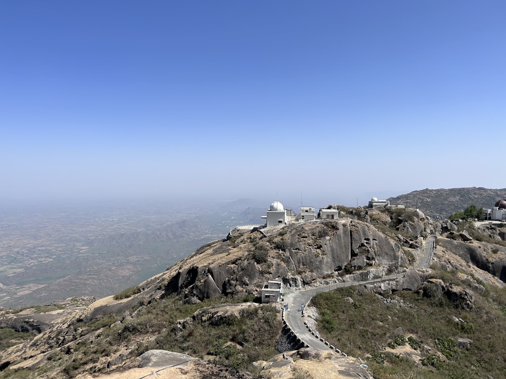 a view of a mountain with a road going up it