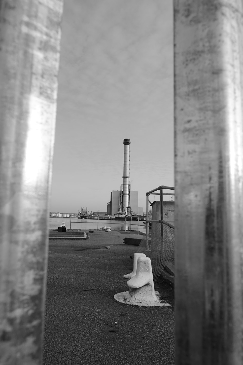 a black and white photo of a factory