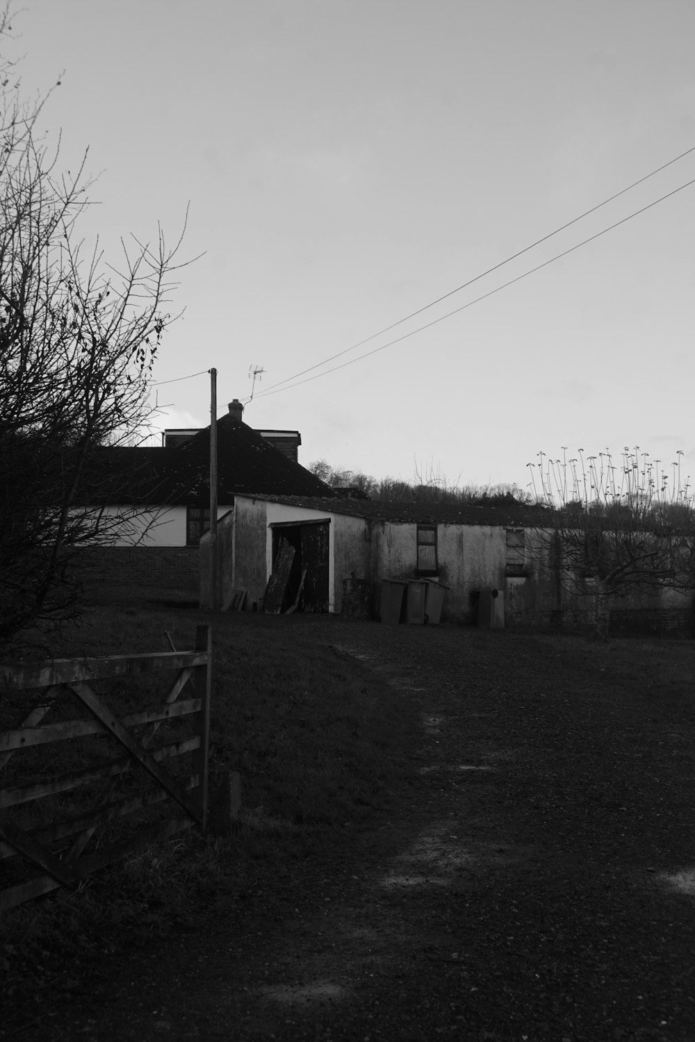 a black and white photo of a small building