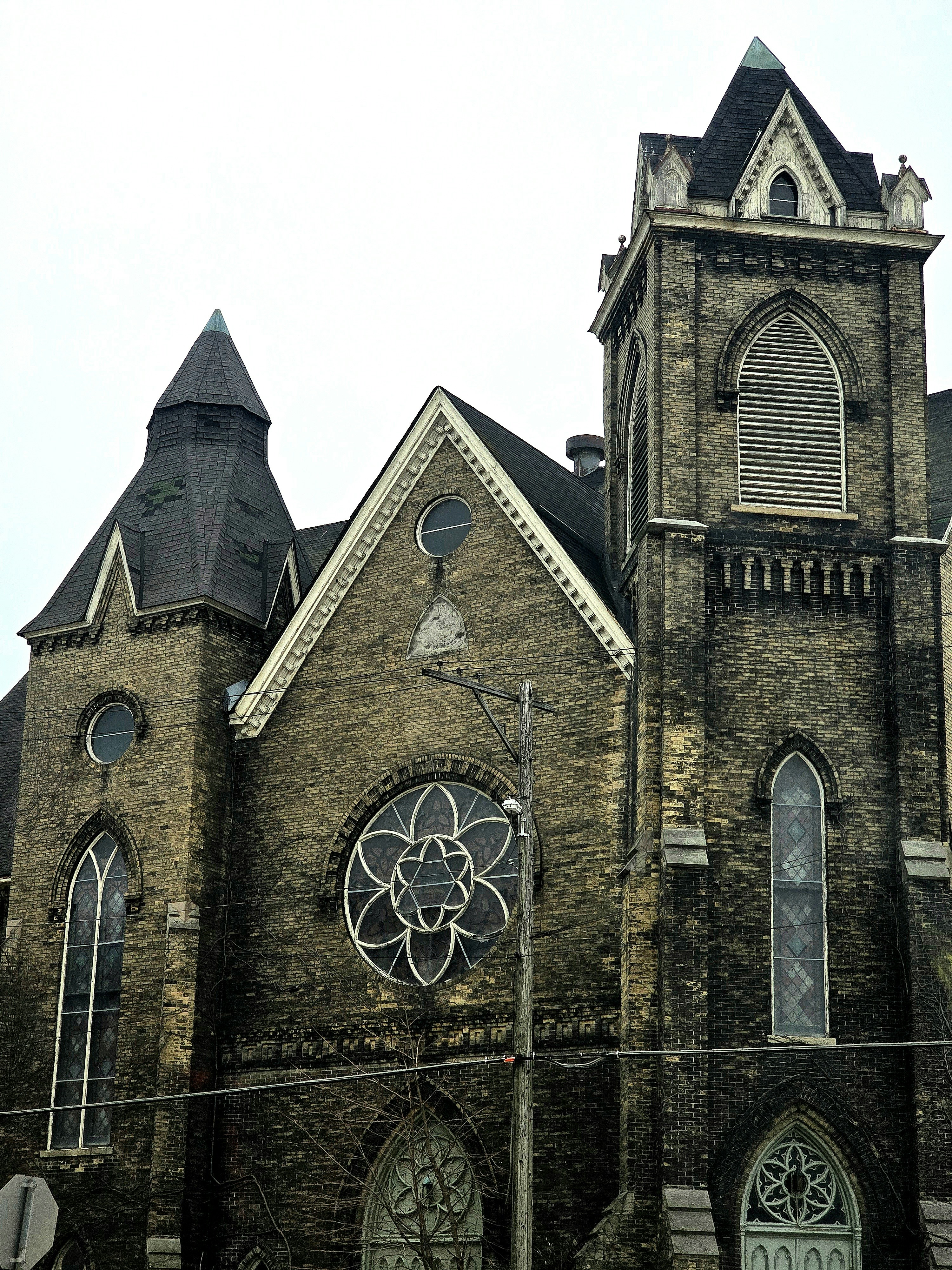 a church with a clock on the front of it
