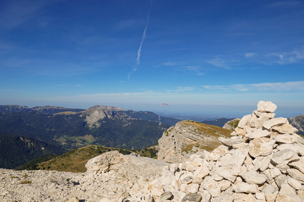 a pile of rocks sitting on top of a mountain