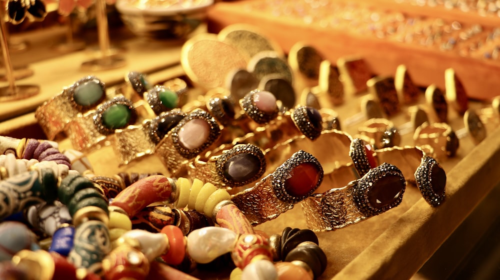 a display of rings and bracelets on a table