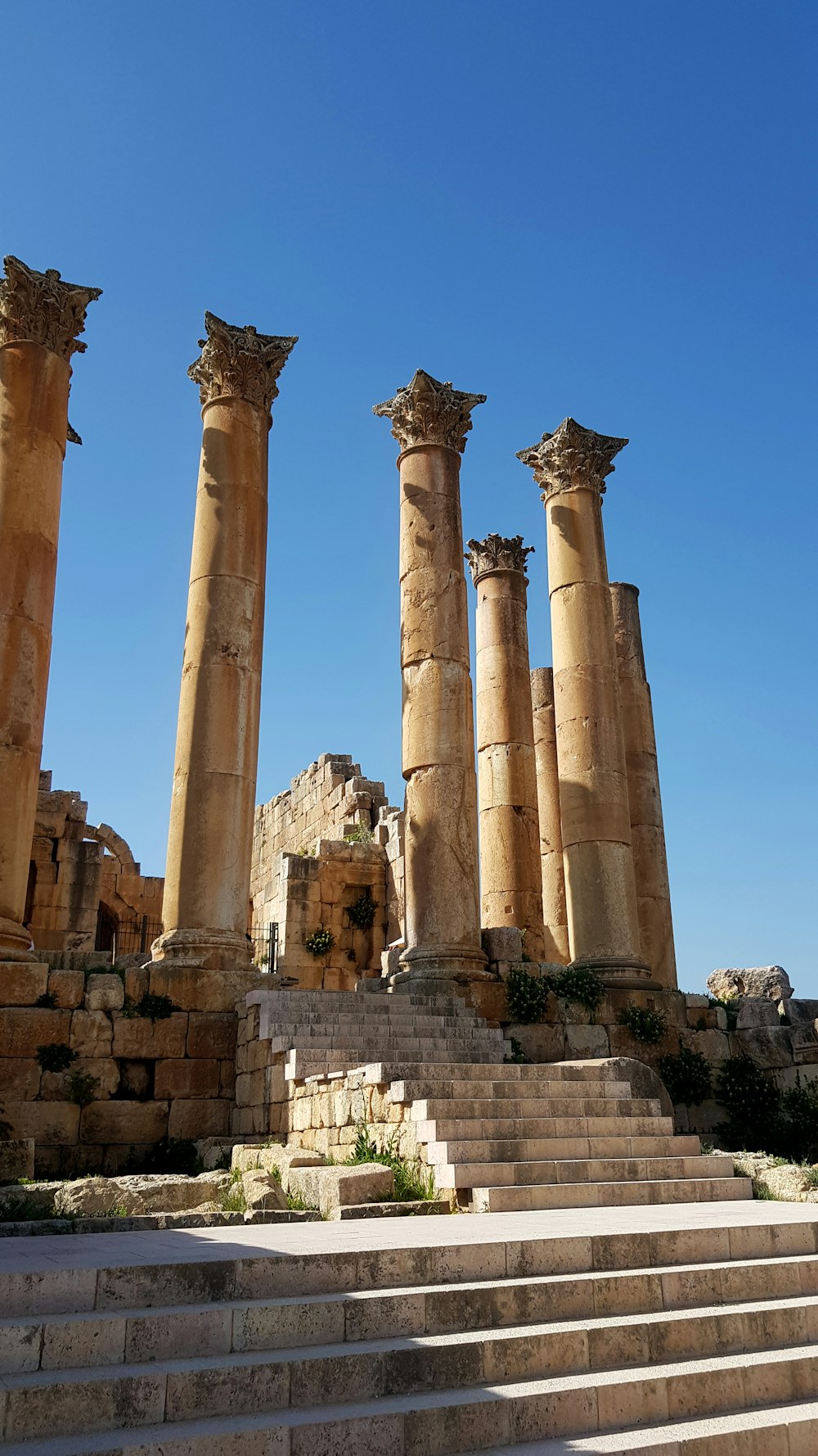 a group of stone pillars sitting next to each other