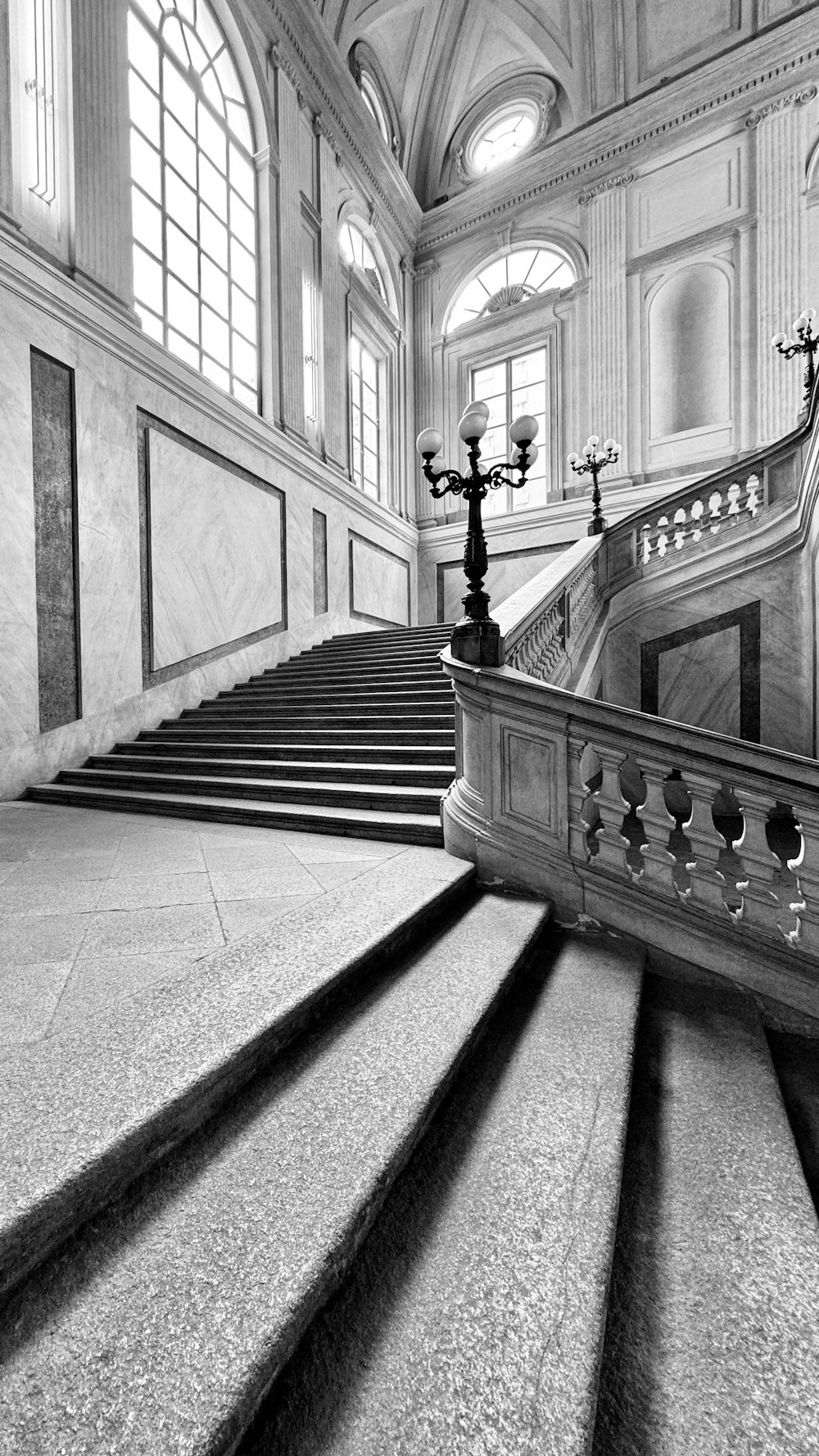 a black and white photo of a staircase
