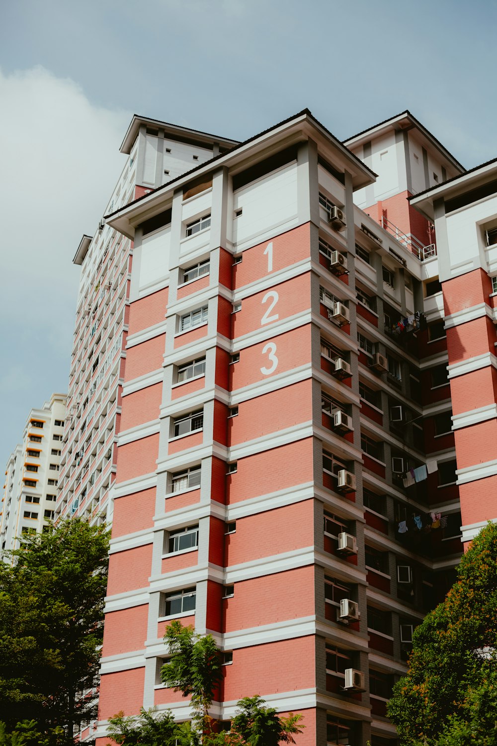 a tall building with a clock on the side of it