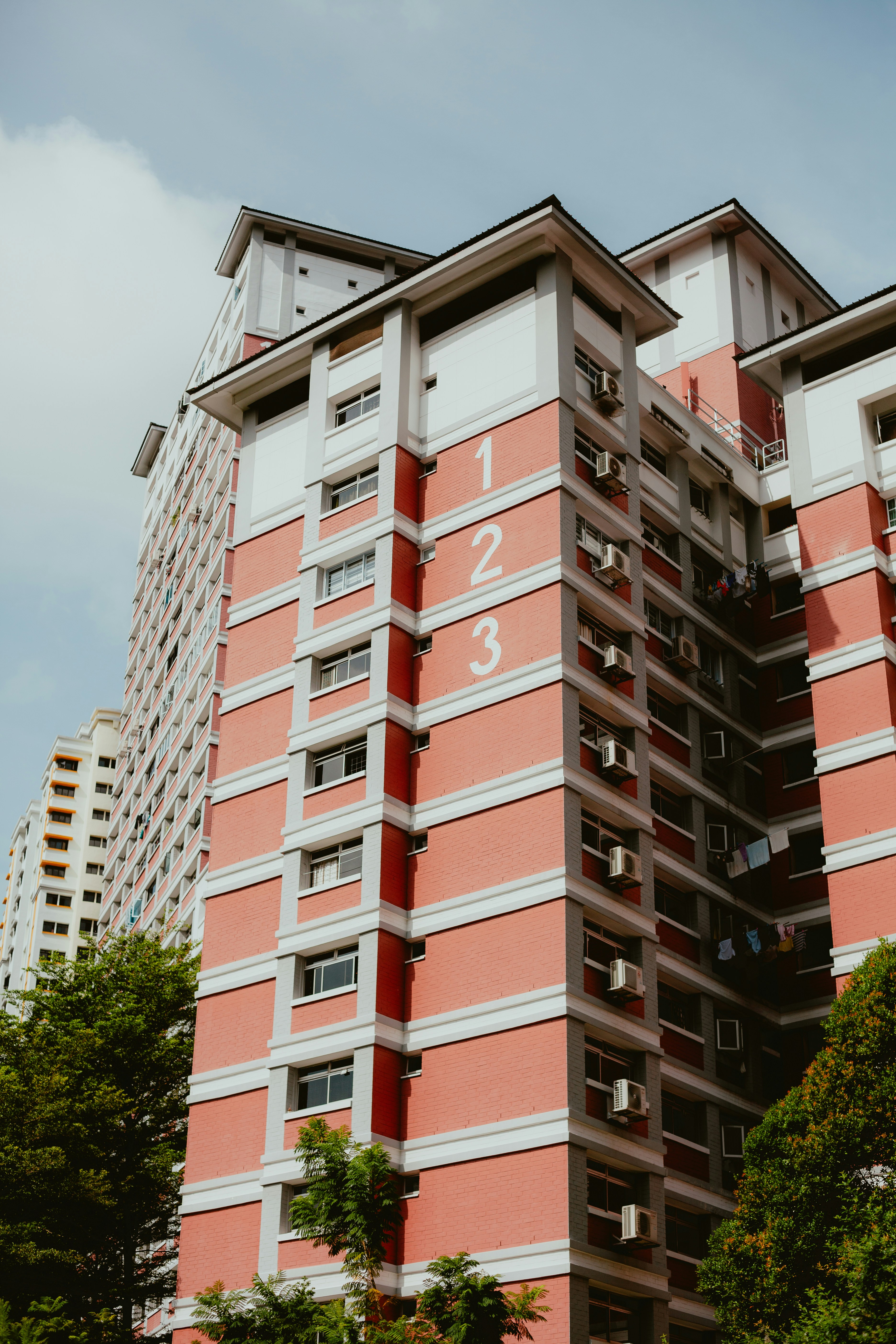 a tall building with a clock on the side of it