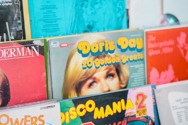 a bunch of records are stacked on top of each other