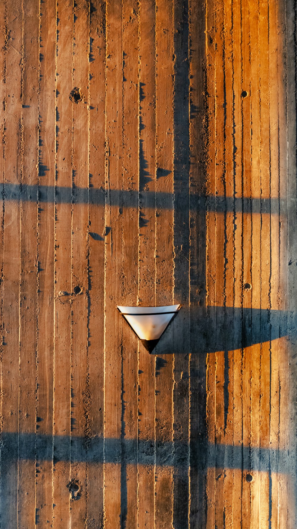 a boat is sitting on a wooden dock