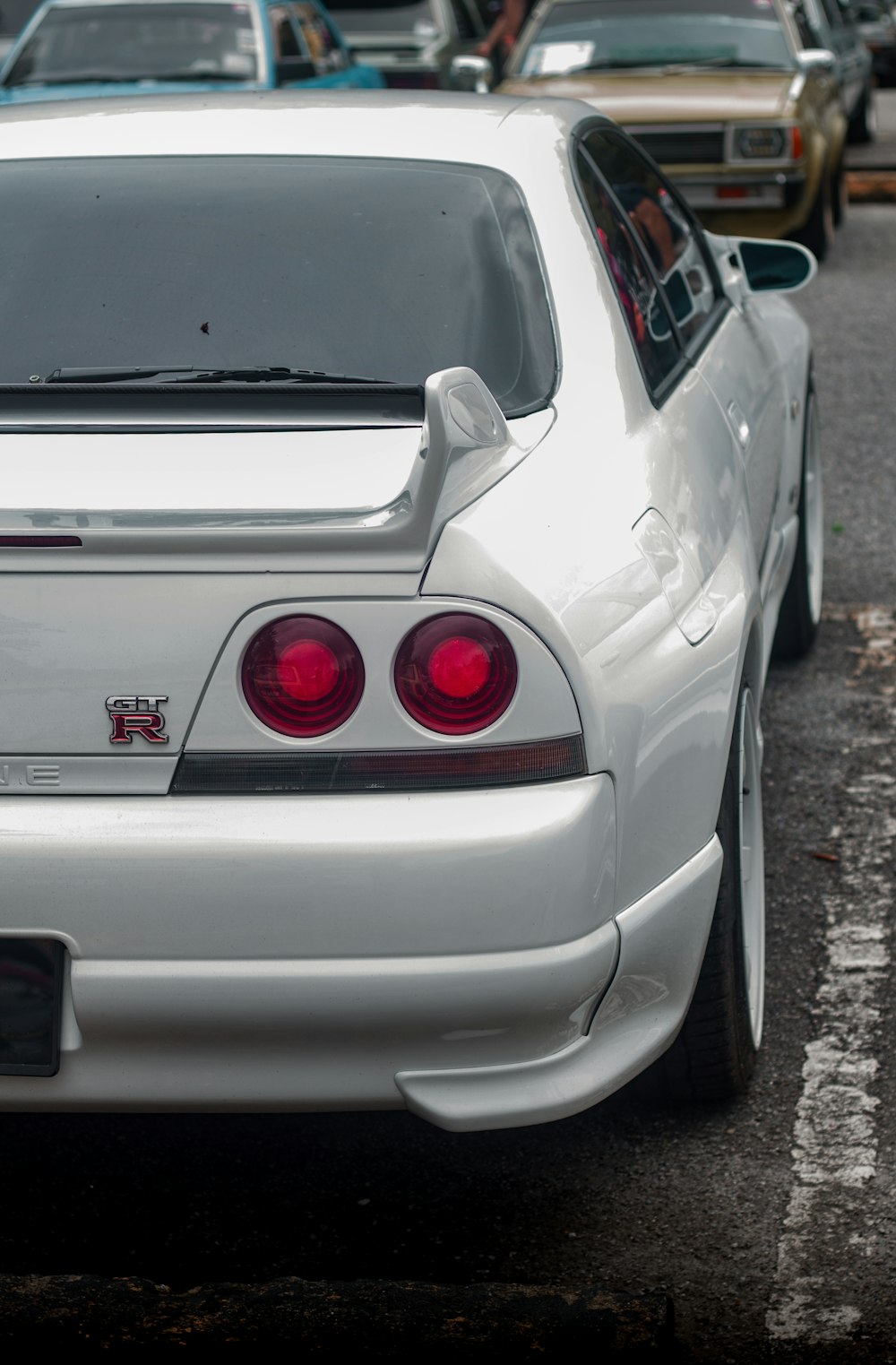 a white car parked in a parking lot