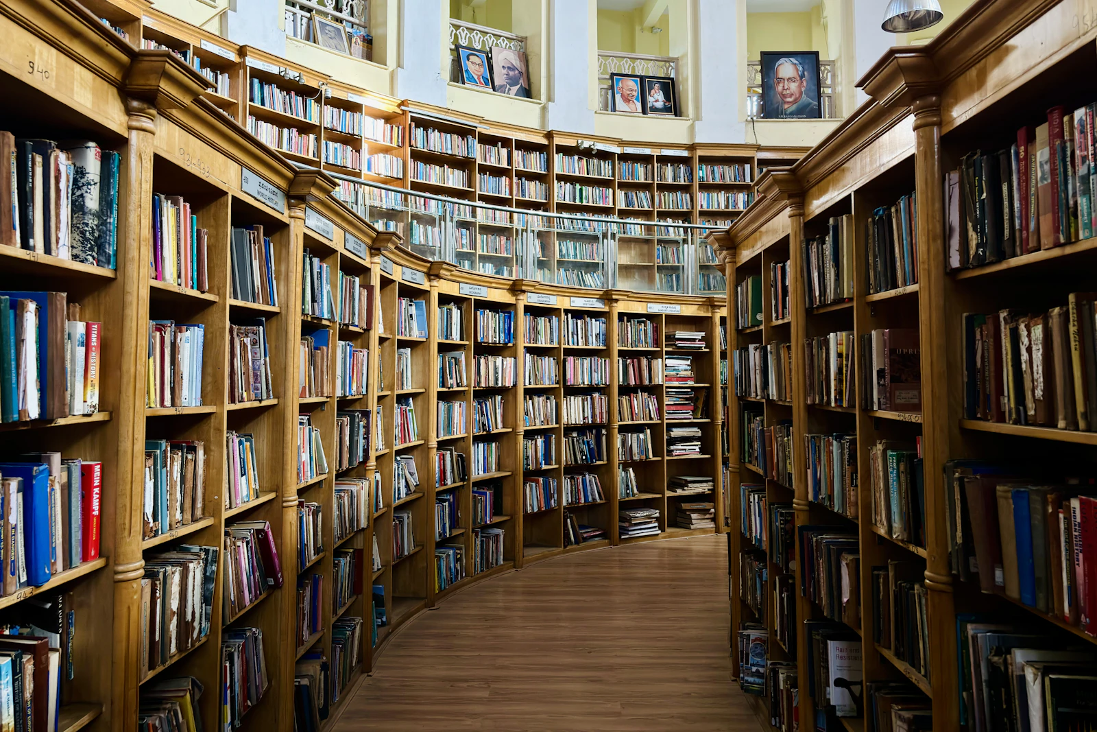 A long row of library bookshelves, representing the structured, catalogued information schema markup gives search engines