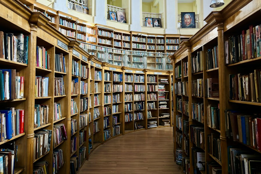 Curved library corridor lined with wooden bookshelves