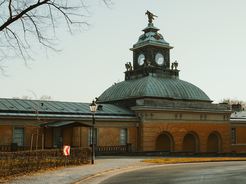 a large building with a clock on the top of it