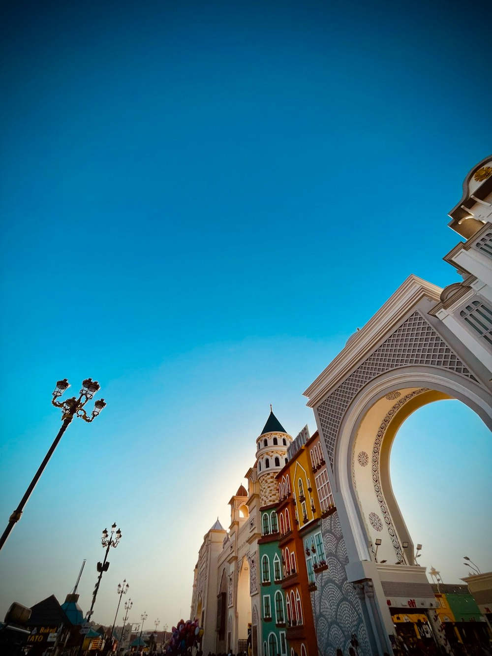 a tall clock tower towering over a city