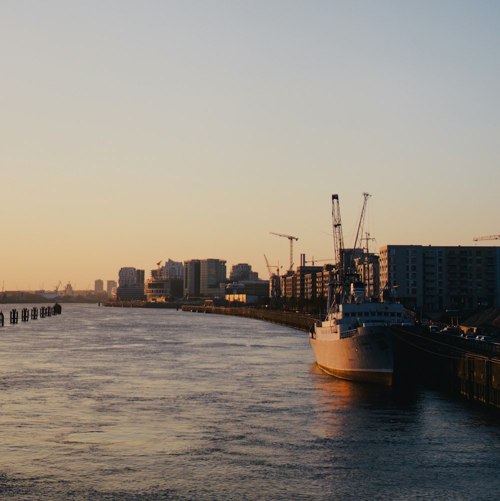 a body of water next to a city