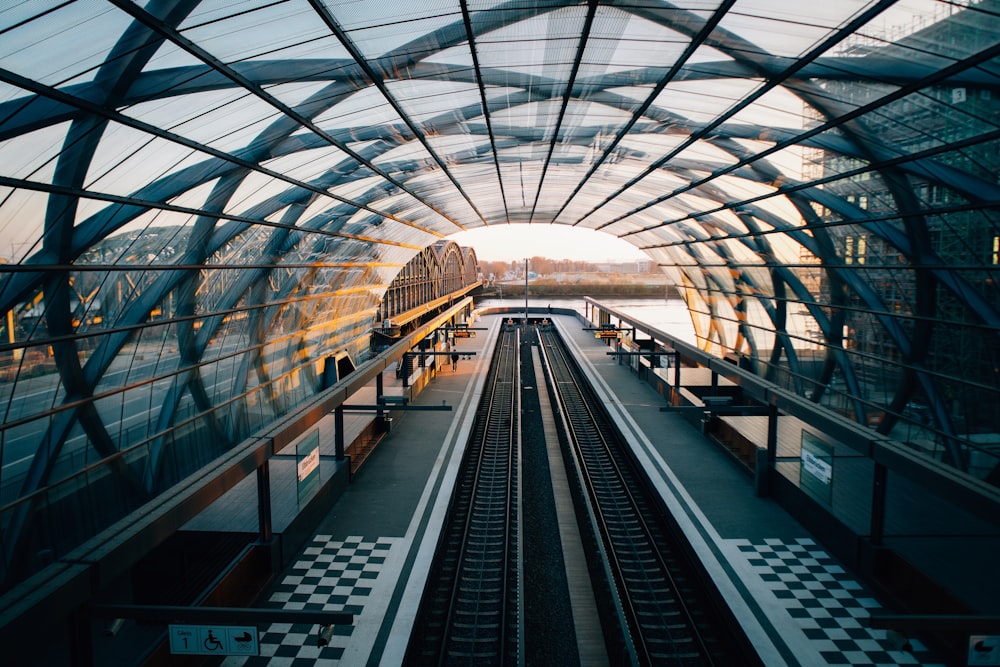 a train station with a train on the tracks