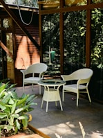 a table and chairs sitting on a patio