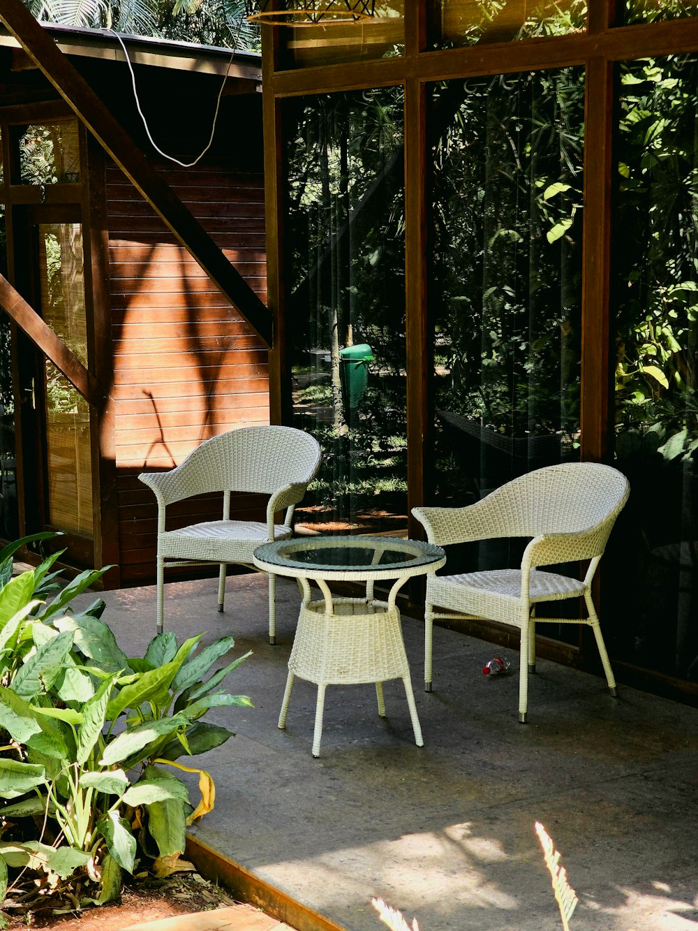 a table and chairs sitting on a patio