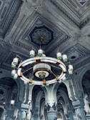 a chandelier hanging from the ceiling of a building