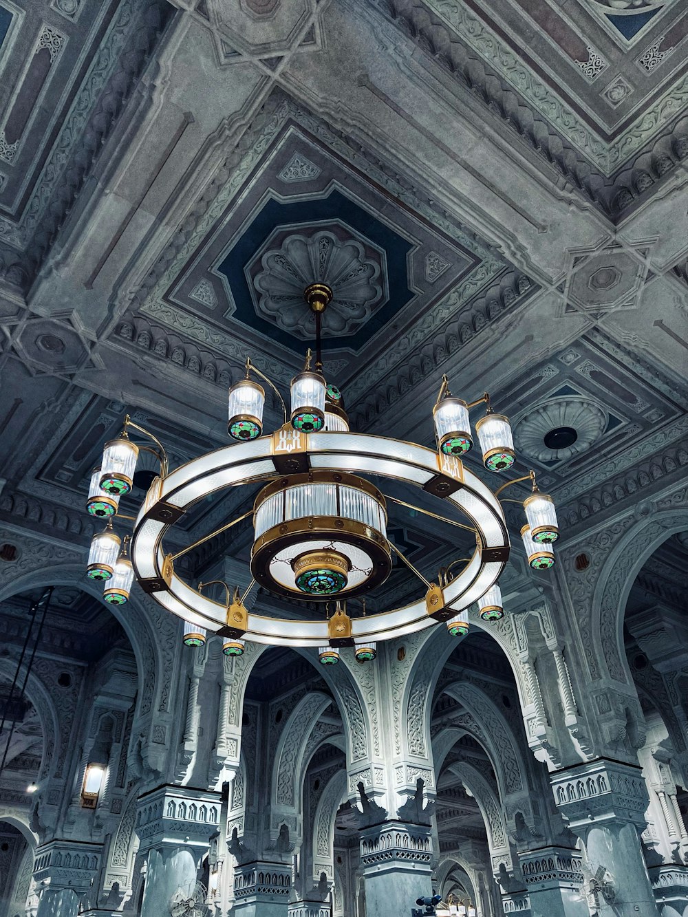 a chandelier hanging from the ceiling of a building