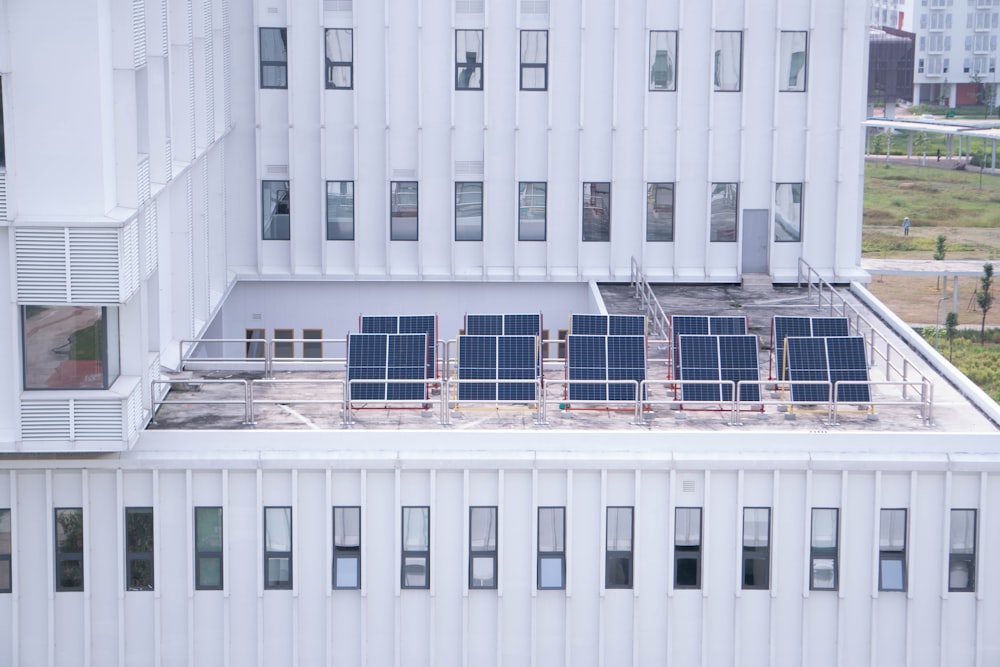 a building with a lot of solar panels on top of it