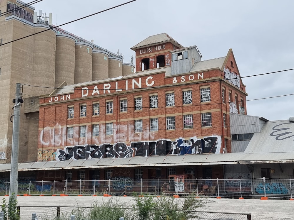 a large building with graffiti on the side of it